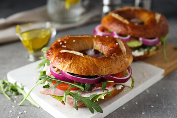 Concept of delicious food - tasty bagel sandwich