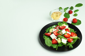 Concept of tasty food, salad with strawberry, space for text
