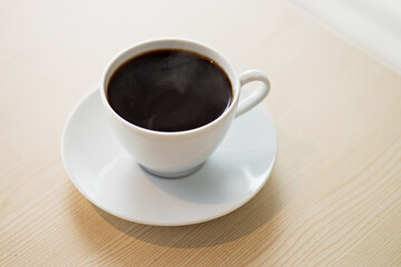 A cup of coffee on cafe table