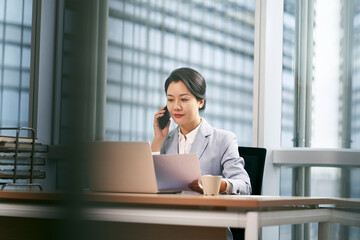 young asian business woman working in modern office