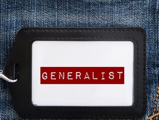 ID CARD holder on jeans with text GENERALIST, refers to one who is knowledgeable many topics and various interests or skills (opposite to specialist who expertise in certain field of study, occupation