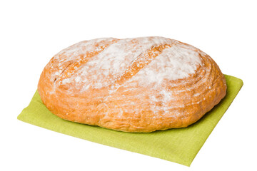 Freshly baked delicious french bread with napkin isolated on white background top view. Healthy white bread loaf