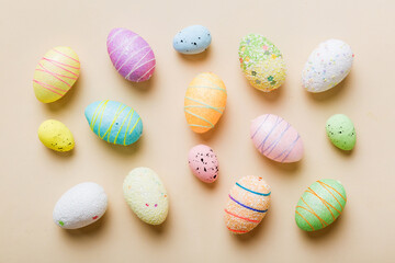 decorative easter eggs on colored background. easter eggs collection top view with copy space