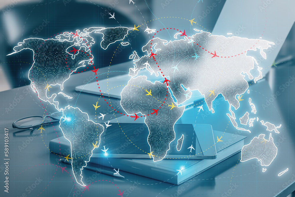Poster close up of workplace with devices and glowing digital map with ariplane connections on blurry backg