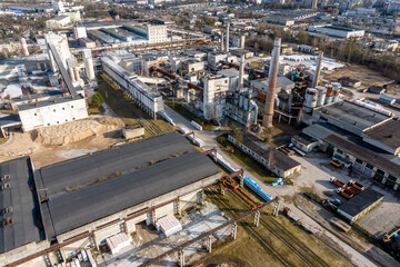 aerial panoramic view of pipes as of an old abandoned factory