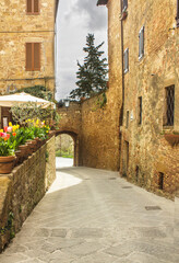 narrow street in the village of Pienza in Italy