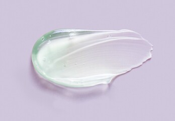 Liquid gel cosmetic smudge drops texture green grey background 