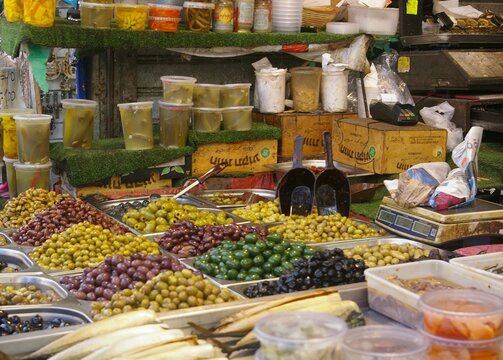 Stand with various kinds of olives in the Carmel Market in Tel Aviv, Israel