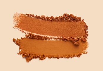 Eye shadow cracked brown and beige and gold smudge texture background