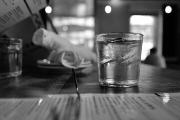 Glass of water with an ice, grayscale