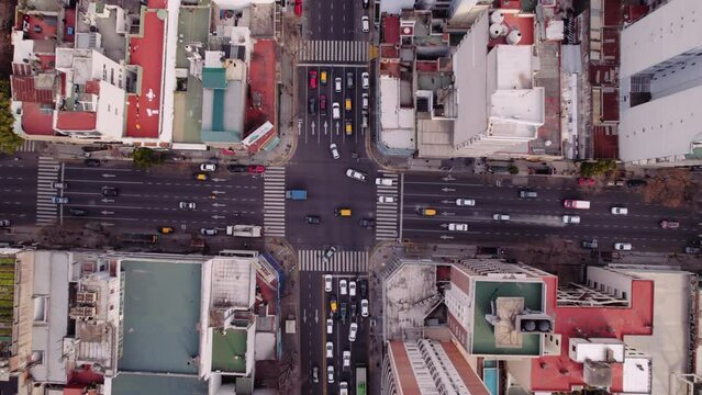 Street in Buenos Aires Argentina, cars crossing