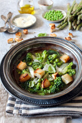 Vegetables soup with toasted bread and parmesan cheese. Top view. Detox food.