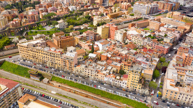 Aerial view of the Pigneto district in Rome, Italy. It is a residential area with many buildings and near the railway tracks.