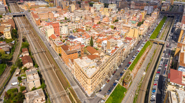 Aerial view of the Pigneto district in Rome, Italy. It is a residential area with many buildings and near the railway tracks.