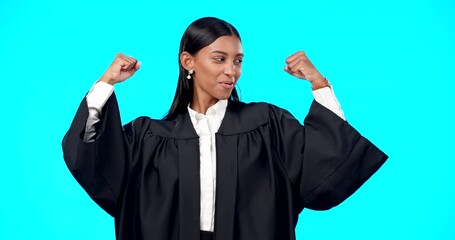 Strong woman lawyer, face and studio with bicep muscle celebration, smile or legal victory by blue background. Judge, happy and indian law expert in portrait to celebrate empowerment by backdrop