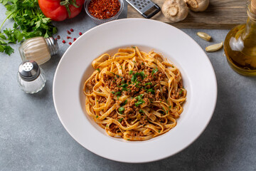 Spaghetti with minced meat in tomato sauce, pasta with noodles. Turkish noodle pasta. Turkish name; Eriste makarna