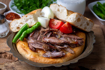 Delicious meat dish from Turkish cuisine; Konya oven kebab, tandoori kebab. Turkish name; Konya furun or firin kebabi, tandir kebabi