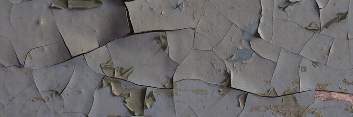 Peeling paint on the wall. Panorama of a concrete wall with old cracked flaking paint. Weathered rough painted surface with patterns of cracks and peeling. Wide panoramic grunge texture for background