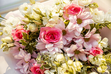 Modern floral bouquet of different flowers, colorful bunch of flowers.pink roses, Chrysanthemum. daisy and Eustoma. Colorful postcard. Congratulation or present concept.