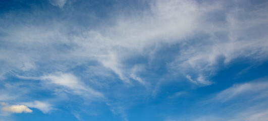 Beautiful white fluffy clouds against blue sky.