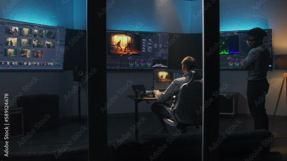 Aufkleber multi ethnic colorist and film maker edit video and make color grading in program. process of colour