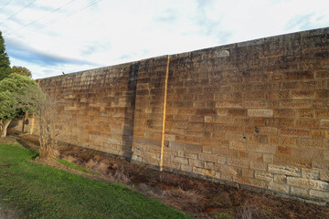 Fototapeta na wymiar Historic stone wall at Berrima New South Wales Australia