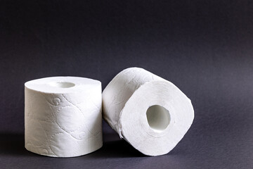 toilet paper isolated on black