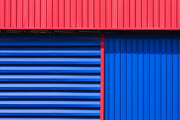 Blue aluminum Louver and Corrugated Steel Wall with red roof Awning of Colorful Warehouse Industrial Building 