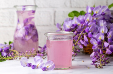 Obraz na płótnie Canvas Drink for health made from Wisteria sinensis flower. Wisteria sinensis sherbet. Turkish name; Mor salkim serbeti
