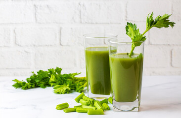 A glass of green celery juice. Celery drink prepared for healthy nutrition and detox.