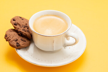 cup of coffee with chocolate cookies with chocolate chips