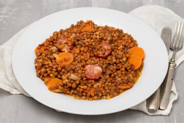 Lentils with chorizo and carrot. Typical Spanish recipe.