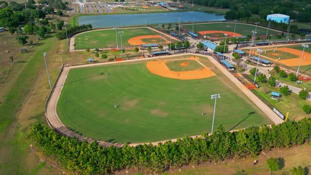 Aerial View Of Baseball Fields Next To A Small Lake - Baseball Diamond In Florida, USA.