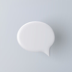 3D white speech bubble icon on a grey background.