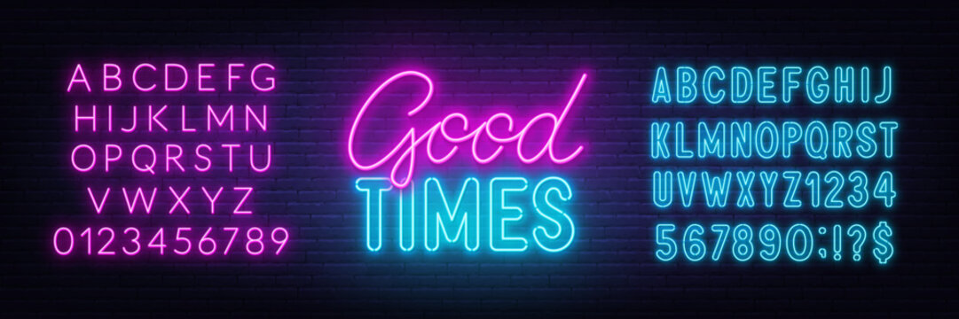 Good Times neon lettering on brick wall background.