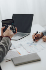 The financiers are calculating personal taxes for their customers.
