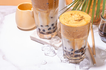 Boba dalgona coffee. Trendy asian latte morning drink with whipped instant coffee and tapioca pearl...