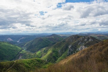 Fototapeta na wymiar Mesmerizing view of a beautiful mountainous landscape against a cloudy sky in Serbia