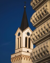 Vertical shot of a cathedral tower on a sunny day in Zrenjanin, Serbia