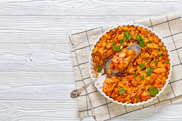 nacho chicken cheese casserole in baking dish