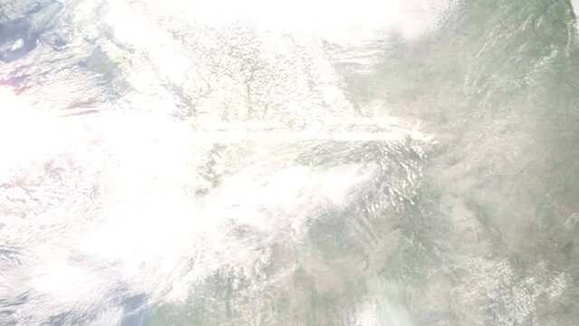 Earth zoom in from outer space to city. Zooming on Pullman, Washington, USA. The animation continues by zoom out through clouds and atmosphere into space. Images from NASA