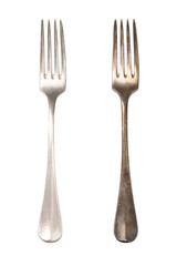 Polished and tarnished sterling silver fork handles, old and often used. Hydrogen sulfide and...