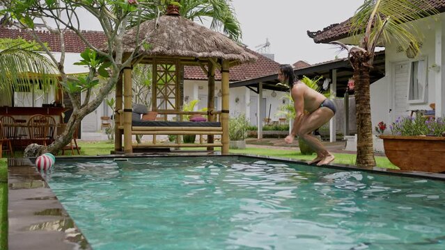  Man Does Round House High Kicks in the Water, Jump in the Pool in Slow Motion