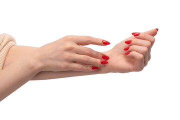 Woman hands with red nails isolated on a white background.