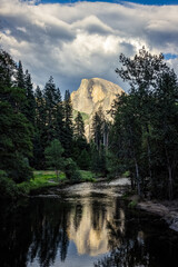 Half Dome view from Sentinel Bridge in a summer sunset.