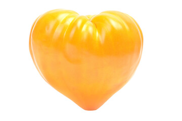 Yellow tomato in the form of a heart on a white background