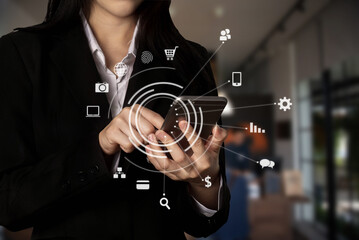 Digital marketing media in virtual icon globe shape business open his hand, working touch screen tablet.