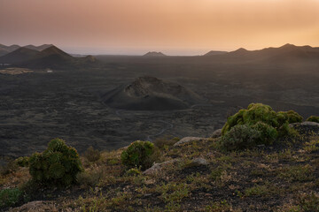 Sunset over the Landscape of Lanzarote with views of the volcanos