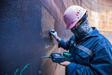 Male worker inspection  ultrasonic thickness corrosion shell plate