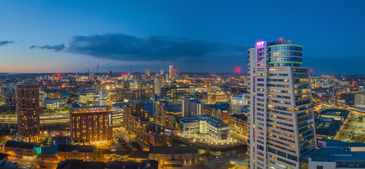 Obraz premium Leeds City Centre and Bridgewater Place. Yorkshire Northern England United Kingdom. City centre at dusk, night lights aerial view